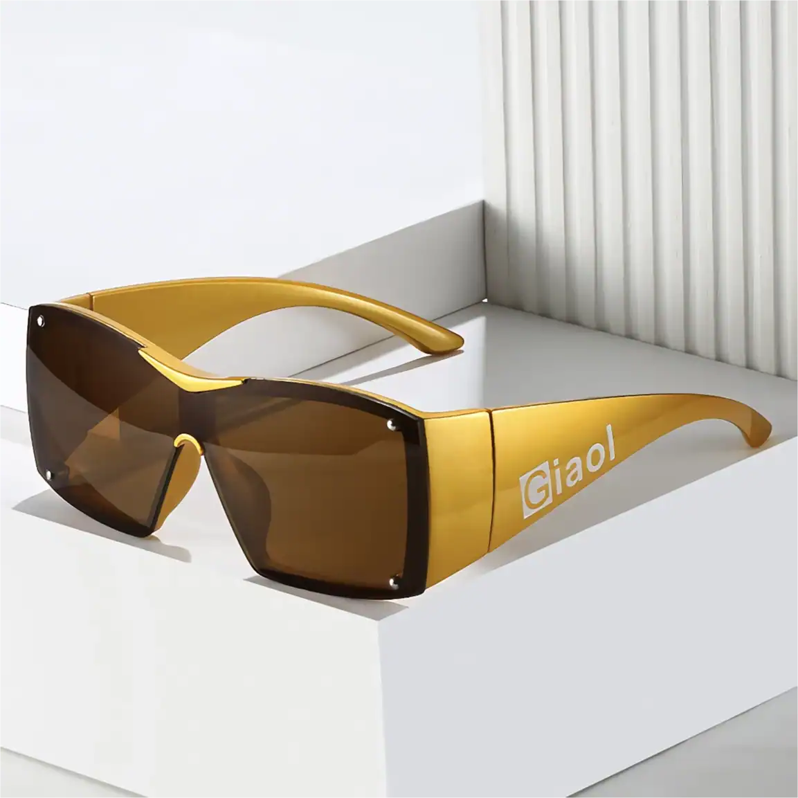 High-quality Giaiol fashion sunglasses with stylish gold frames and tinted lenses, perfect for modern eyewear enthusiasts and sun protection.