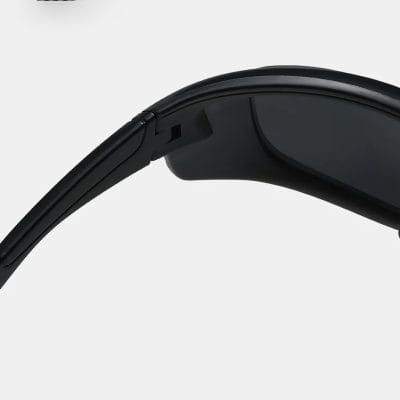 Stylish black Bluetooth sunglasses with built-in wireless earbuds for hands-free calls and music. Perfect for outdoor activities and modern tech lovers.