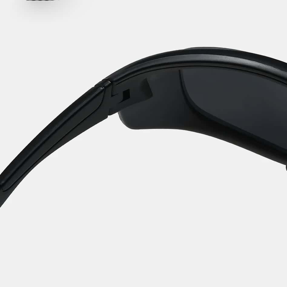 Stylish black Bluetooth sunglasses with built-in wireless earbuds for hands-free calls and music. Perfect for outdoor activities and modern tech lovers.