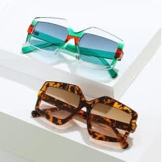 Stylish oversized sunglasses with colorful and tortoiseshell frames, perfect for fashion-forward individuals seeking UV protection and a trendy accessory.