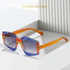 Stylish oversized sunglasses with gradient lenses and vibrant orange and blue frames, perfect for trendy eye protection and sunshade.