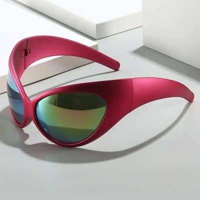 Stylish pink sports sunglasses with mirrored green lenses, perfect for outdoor activities and UV protection. Unique design offers comfort and eye health protection.