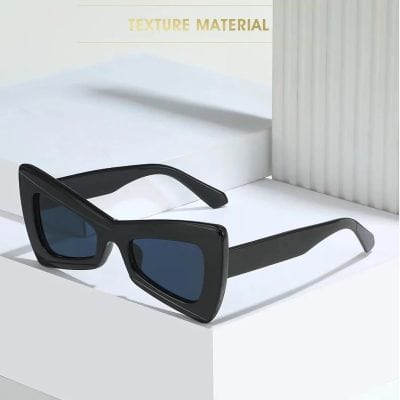 Stylish black sunglasses with large square frames perfect for eye protection and fashion statement. Ideal for all-day outdoor wear and UV protection.