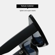 Close-up of sleek black sunglasses or optical frames on a modern, high-quality display stand emphasizing lightweight, super elastic texture material for advanced optical store presentation.