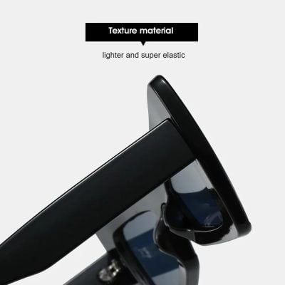 Close-up of sleek black sunglasses or optical frames on a modern, high-quality display stand emphasizing lightweight, super elastic texture material for advanced optical store presentation.