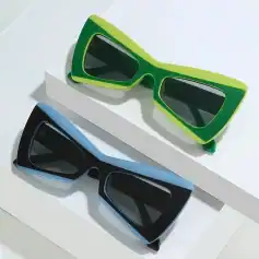 Stylish green and blue optical sunglasses for UV protection and fashion. Perfect for everyday wear, offering high-quality materials and modern design for ultimate eye protection and style.