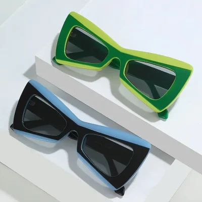 Stylish green and blue optical sunglasses for UV protection and fashion. Perfect for everyday wear, offering high-quality materials and modern design for ultimate eye protection and style.