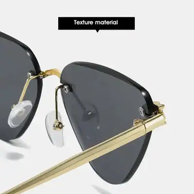 High-end black sunglasses with gold accents and textured details, perfect for stylish sun protection.