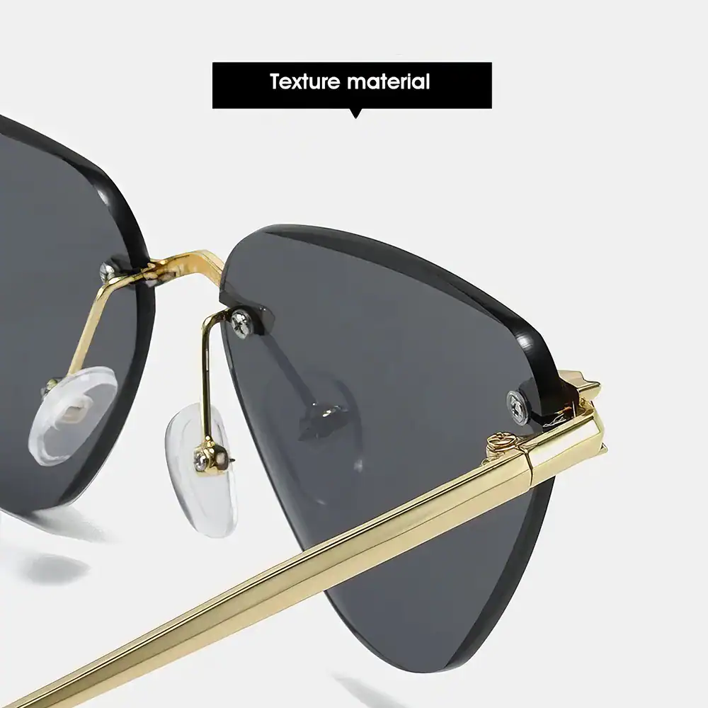 High-end black sunglasses with gold accents and textured details, perfect for stylish sun protection.