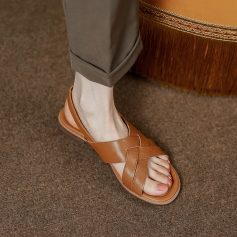 Comfortable brown leather sandals with cross-strap design for women, perfect for casual or summer wear, from Monalisa Medical Store.