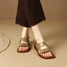 Versatile women's leather sandals featuring adjustable straps, durable construction, and stylish design for comfort, perfect for casual outings and daily activities.