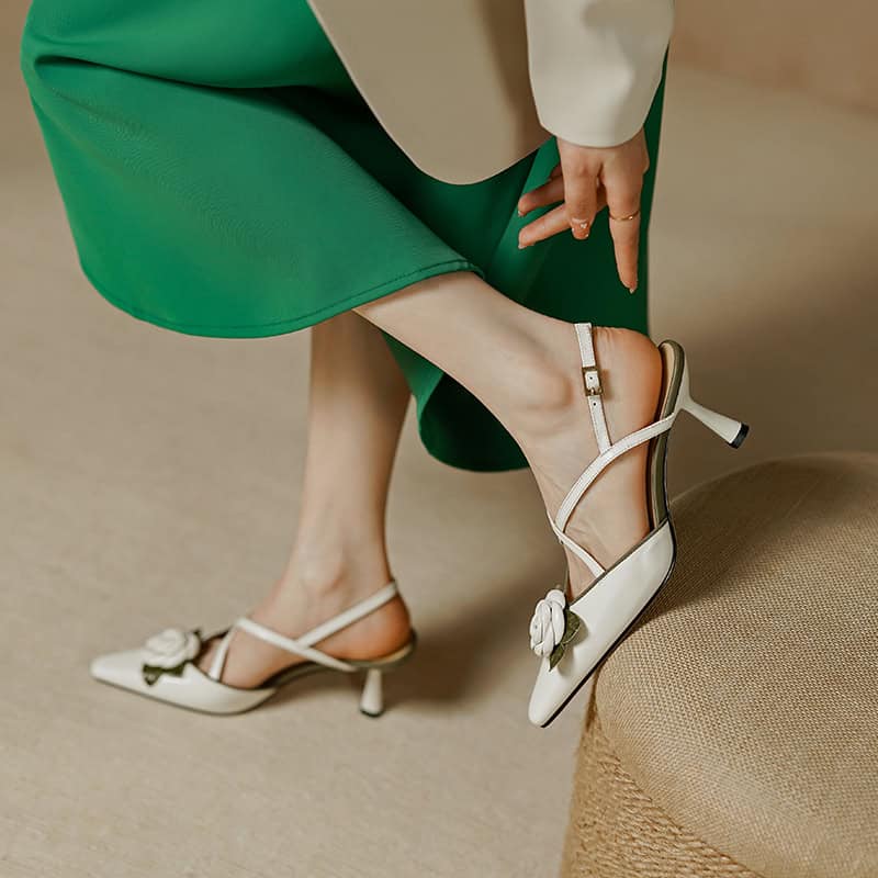 Step into elegance with these beautiful white heels featuring floral accents, ideal for formal and special occasions. Designed for women who appreciate fashionable, comfortable, and stylish footwear for various events.