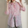 Light pink floral sheer cover-up for women, perfect for beach or casual wear, stylish and comfortable.