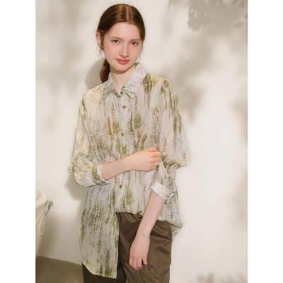 Stylish women's patterned oversized blouse with button-up design, perfect for trendy casual or office wear. Available at Monalisa Store for fashionable women.