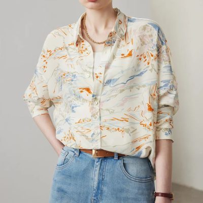 Stylish women's blouse with abstract pastel print, perfect for casual or professional wear, designed for comfort and chic fashion.