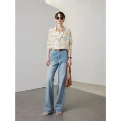 Elegant woman with fashionable sunglasses from Monalisa Optical store, showcasing stylish eyewear options for modern fashion; perfect for those seeking high-quality glasses.