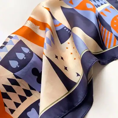 Bright, colorful print featuring spades, hearts, diamonds, and clubs on high-quality fabric for fashion-forward styling.