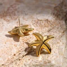 Luxury gold butterfly earrings, perfect for women seeking stylish, high-quality accessories or eye-catching jewelry pieces. Ideal for fashion, gifts, or special occasions.