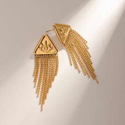 Gold eye-shaped earrings with dangling chains, perfect for stylish accessorizing and eye-catching fashion statements.