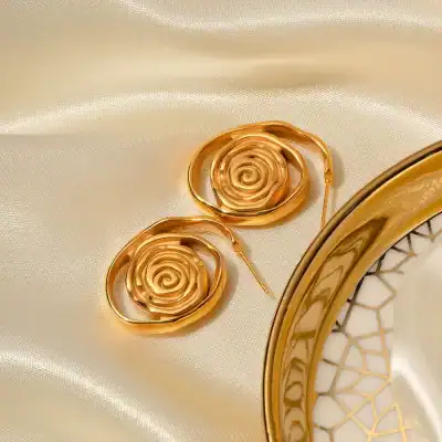 Dainty gold spiral earrings, perfect for stylish women, added elegance to any outfit. Ideal for special occasions, jewelry lovers, and gift-giving.