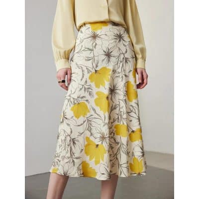 Stylish women's floral midi skirt with yellow and gray flower print, perfect for casual and office wear - upgrade your wardrobe today.