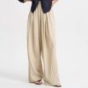 Comfortable beige linen wide-leg pants for women, perfect for casual and stylish summer outfits. Soft, breathable fabric with a relaxed fit for all-day comfort.