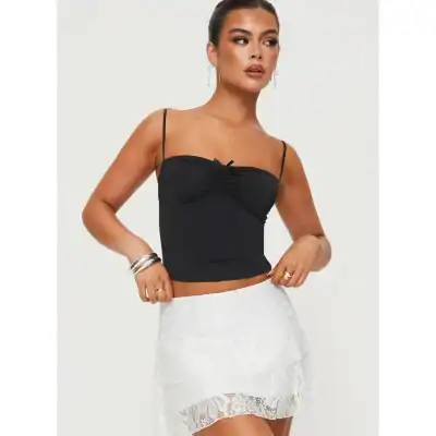 Elegant black strappy crop top with ruched design, ideal for summer fashion and trendy outfits.