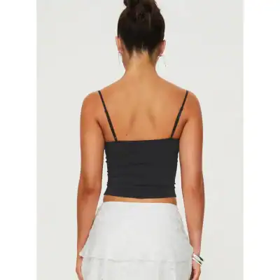 Spaghetti strap black top ideal for stylish, casual wear. Perfect for warm weather, pairing with jeans or skirts for a chic look. Experience comfort and fashion with this versatile top.