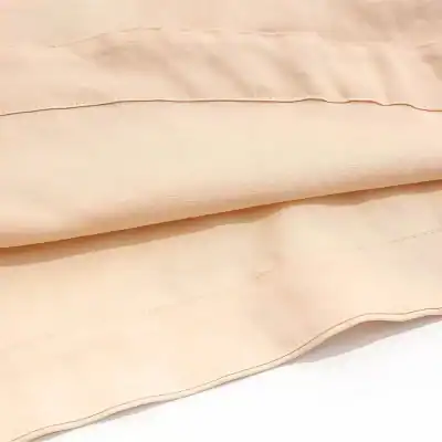 Luxurious beige silk compression clothing for medical and aesthetic use, designed for comfort and effective support, available at Monalisa Store for optimal skincare and body contouring.