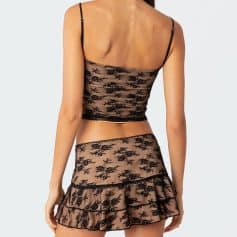 Delicate black lace women's lingerie set with floral design, featuring a fitted cami top and layered ruffle skirt for a stylish and seductive look. Perfect for intimate wear.