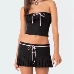 Black summer crop top with pink ribbon tie, trendy casual wear for women. Comfortable, stylish, and perfect for pairing with skirts or jeans for a fashionable everyday outfit.