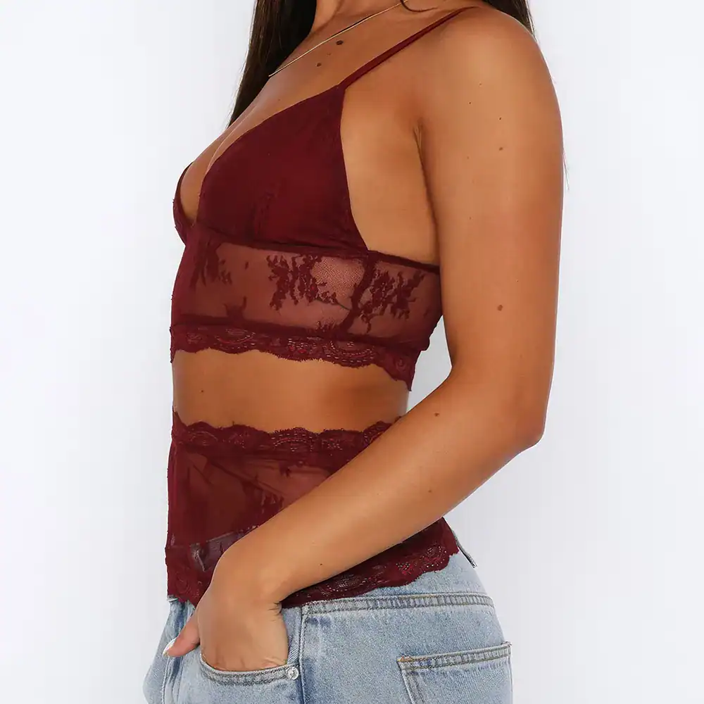 Elegant women's red lace lingerie crop top with matching high-waisted panties, perfect for intimate wear or special occasions.