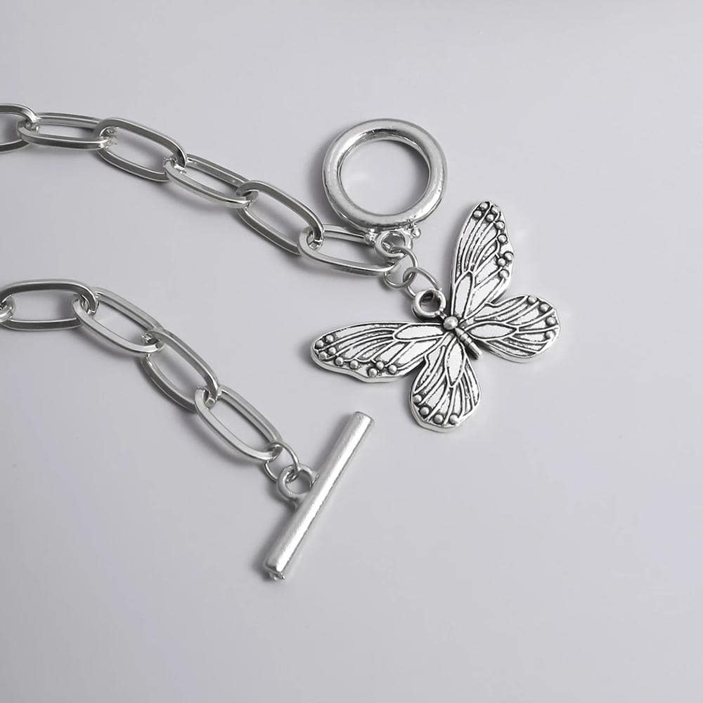 Elegant butterfly charm on a silver chain, perfect for stylish accessories and statement jewelry.