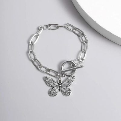 Sterling silver butterfly charm bracelet with bold chain links, perfect for women's fashion accessories and gift ideas.