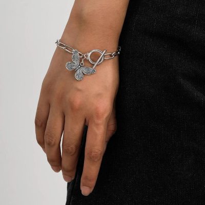 Elegant silver bracelet featuring a butterfly charm and toggle closure, perfect for enhancing your style. Shop high-quality jewelry at Monalisa Store for stunning accessories.