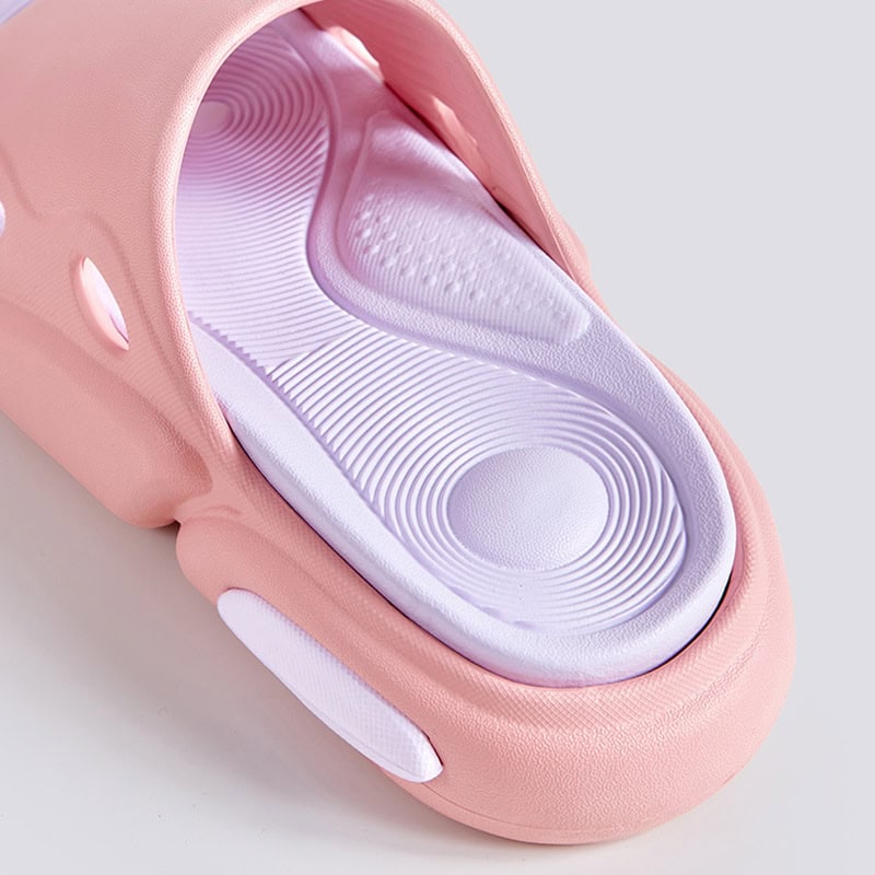 Comfortable pink orthotic shoe insole with ergonomic design for foot support and arch relief, ideal for improving shoe comfort and preventing foot fatigue.