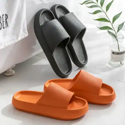 Comfortable black and orange slippers, ideal for home or spa use, available at Monalisa Medical. Stylish, lightweight, and perfect for relaxation.