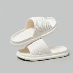 Stylish white slide sandals perfect for casual wear and outpatient settings, designed for comfort and ease of use.