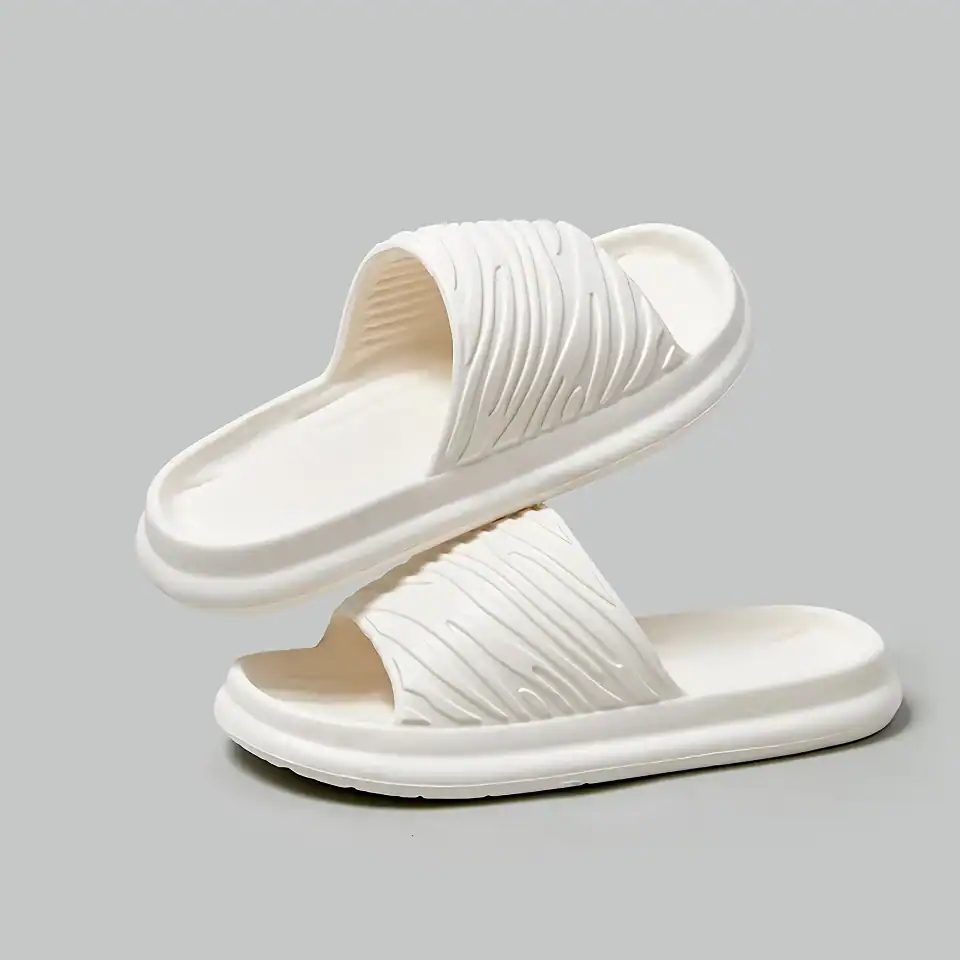 Stylish white slide sandals perfect for casual wear and outpatient settings, designed for comfort and ease of use.