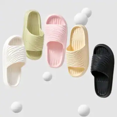 Stylish, lightweight slide slippers ideal for casual wear, available in white, beige, pink, green, and black. Perfect for everyday fashion and wellness needs.