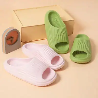 Soft, eco-friendly slippers in pastel green and pink, perfect for relaxation and indoor wear from Monalisa Medical store.