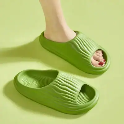 Comfortable green slide sandals for women, stylish and lightweight for everyday wear. Ideal for casual outings, designed for foot health and style.