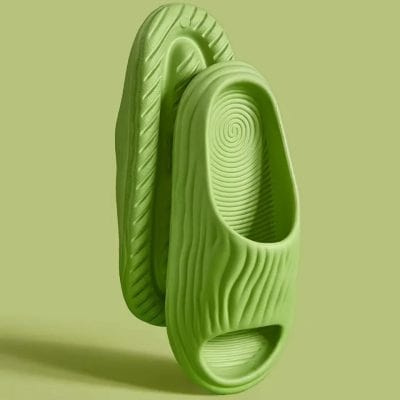 Innovative green footwear with unique textured design, combining style and comfort, ideal for casual and athletic occasions.