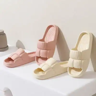 High-quality women's spa slides in pastel pink and cream, designed for comfort and relaxation, available at Monalisa Store with a focus on health, wellness, and leisure footwear.