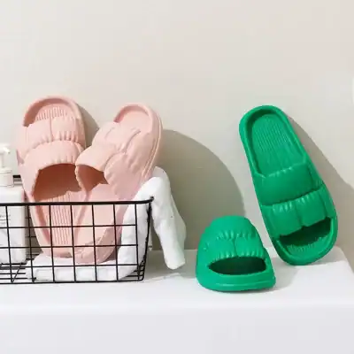 Comfortable pink and green foot spa slippers for at-home pedicures and foot care. Durable, lightweight, and easy to clean, perfect for relaxing foot treatments.