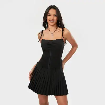 Stylish black mini dress with pleated skirt and adjustable shoulder ties, perfect for fashion-forward women and special occasions.