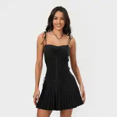 Elegant women’s black corset top with adjustable shoulder ties, perfect for fashion-forward outfit ideas and special occasions.