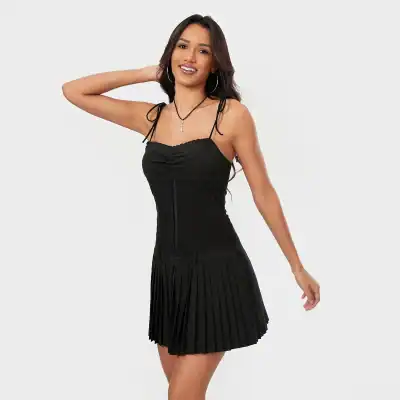 Black women's dress featuring a fitted, ruched bodice with adjustable shoulder ties and a pleated, A-line skirt, ideal for a chic, versatile look.
