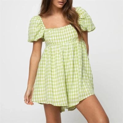 Light green gingham puff sleeve dress for women, perfect for casual summer wear and beach outings. Comfortable, stylish, and breathable fabric for an effortless summer look.