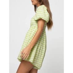 Gingham short dress with puff sleeves, perfect for summer, featuring a comfortable fit and stylish design. Ideal for casual wear and outdoor events, offering a trendy, fresh look all season long.